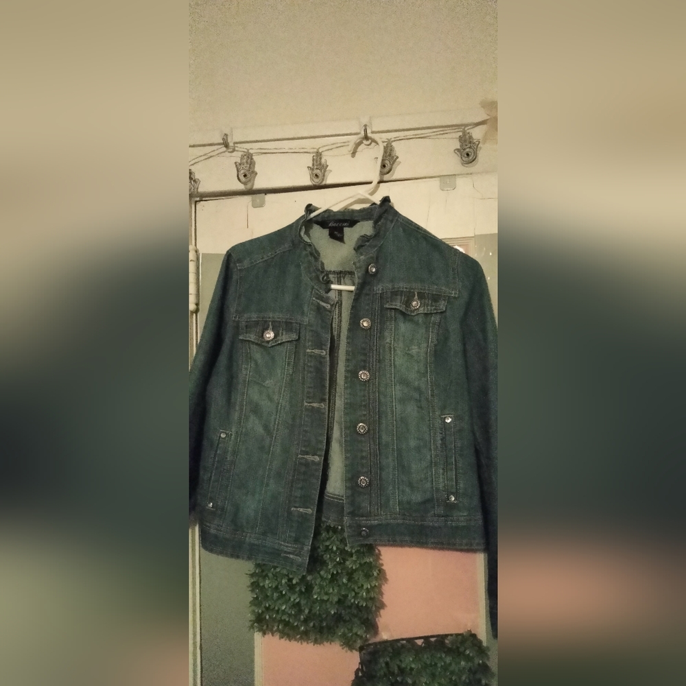 Jean jacket. Size petite small, ruffle collar, blue